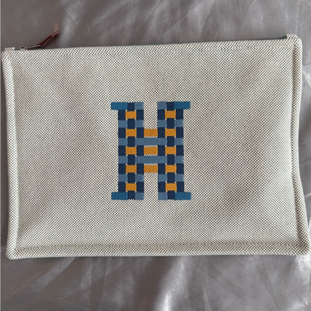 Hermes H Tissage pouch. So cute! Can be used as an adorable clutch.